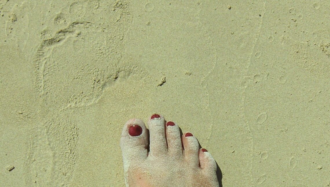 Foot & print in GPS sand